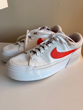 Nike Court Legacy Lift White Low-Top Sneakers with Orange Swoosh